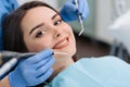 Woman having teeth examined at dentists Royalty Free Stock Photo