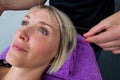 Woman having threading hair removal procedure Royalty Free Stock Photo