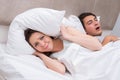 The woman having trouble with husband snoring Royalty Free Stock Photo