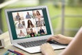 Woman having video chat with colleagues at table, closeup. Team work Royalty Free Stock Photo