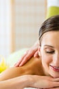 Woman having a wellness back massage Royalty Free Stock Photo