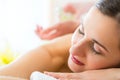 Woman having wellness back massage in spa Royalty Free Stock Photo