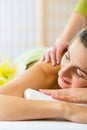 Woman having wellness back massage in spa Royalty Free Stock Photo