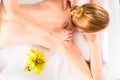 Woman having wellness massage in spa Royalty Free Stock Photo