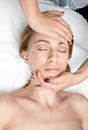 Woman on head massage in wellness