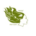 Woman head with wavy hair and leaves in it