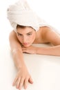 Woman with head wrapped towel Royalty Free Stock Photo