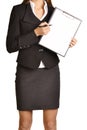 Woman headless writes ballpoint pen on a clipboard