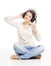 Woman in headphones listening to music. Woman portrait