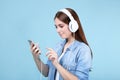 Woman with headphones and mobile phone Royalty Free Stock Photo