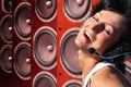 Woman with headphones and music Audio speakers