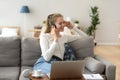 Woman in headset listening music feels good