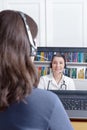 Woman headset video call doctor Royalty Free Stock Photo