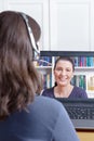 Woman headset video call friend Royalty Free Stock Photo