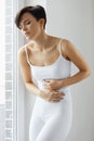 Woman Health. Beautiful Female Feeling Pain In Stomach Royalty Free Stock Photo