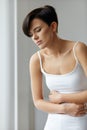 Woman Health. Beautiful Female Feeling Pain In Stomach Royalty Free Stock Photo