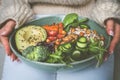 Woman with healthy meal. Bowl with fresh vegetables. Healthy eating or diet. Healthy food plate Royalty Free Stock Photo