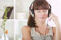 Woman hearing music at home