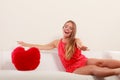 Woman with heart shape pillow. Valentines day love Royalty Free Stock Photo