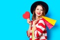 Woman with heart shape toy and shopping bags Royalty Free Stock Photo