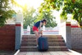 A woman with heavy suitcase hardly climbs the stairs Royalty Free Stock Photo