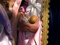 Woman held a Jesus child figure