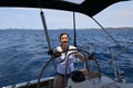 Woman at the helm of Croatia sailboat