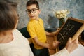 Woman helping grandson study math at home Royalty Free Stock Photo