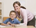 Woman Helping Son with Homework Royalty Free Stock Photo