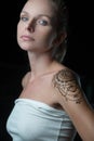 Woman with henna tattoo on her shoulder Royalty Free Stock Photo