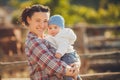 Woman with her baby on nature outdoor