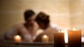 Woman and her beloved man having bath, couple spending time in cozy bathtub