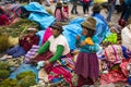 Woman and her children in a street market at the Plaza de Armas in the city of Cuzco in Peru. Royalty Free Stock Photo