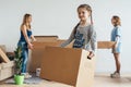 Woman and her daughters moving in new home Royalty Free Stock Photo