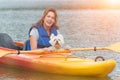 Woman and her dog on a kayak Royalty Free Stock Photo
