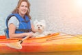 Woman and her dog on a kayak Royalty Free Stock Photo