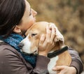 Woman with her dog tender hugs Royalty Free Stock Photo