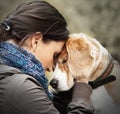 Woman with her dog tender scene Royalty Free Stock Photo