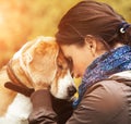 Woman with her dog tender scene Royalty Free Stock Photo