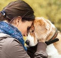 Woman with her dog tender scene Royalty Free Stock Photo