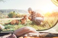 Woman and her dog tender scene near the camping tent. Active leisure, traveling with pet6 simple things concept image Royalty Free Stock Photo