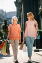 Woman and her elderly mother going shopping together Royalty Free Stock Photo