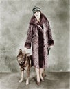 Woman in her Giraffe patterned fur coat and her dog