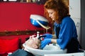 Woman in her hair studio small business concept Royalty Free Stock Photo