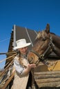 Woman and her horse at farm Royalty Free Stock Photo