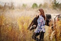 Woman and her horse outdoors Royalty Free Stock Photo