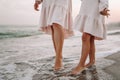 Woman and her little daughter on the beach Royalty Free Stock Photo