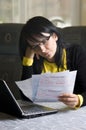 Woman and her monthly bills Royalty Free Stock Photo