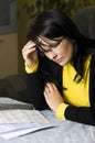 Woman and her monthly bills Royalty Free Stock Photo