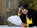 Woman and her monthly bills Royalty Free Stock Photo